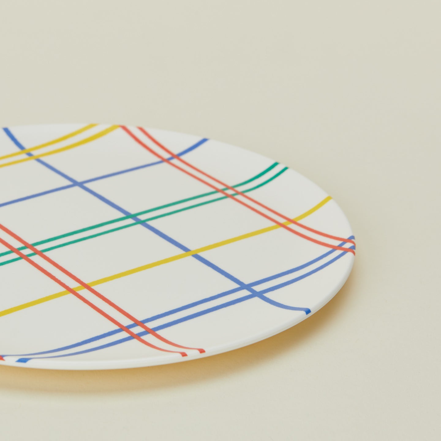 Close up view of Bamboo Melamine Side Plate in Mixed Plaid