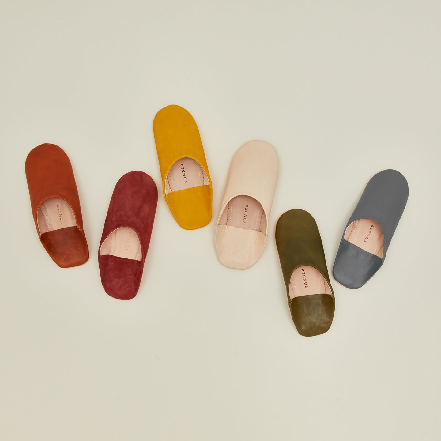 Yonder leather slippers in various colors