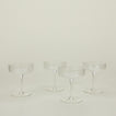 Four Veneziano coupe glasses.