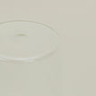 Close up of the bottom of the Essential Glass in Clear.