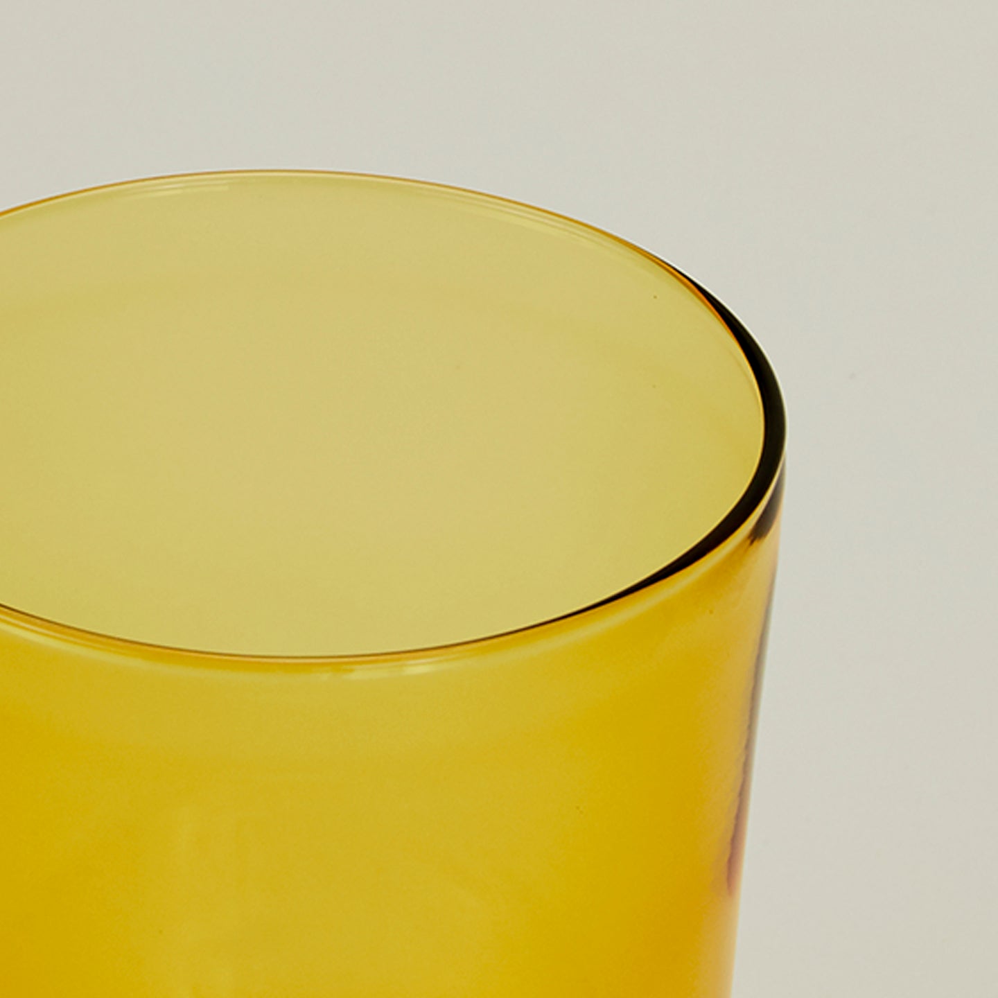 Close up of the rim of the Essential Glass in Amber.