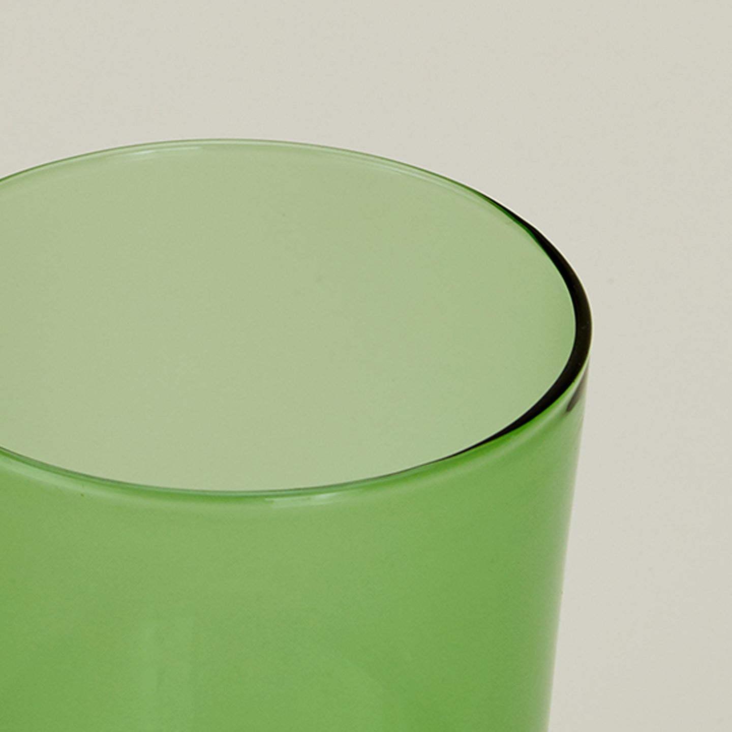 Close up of the rim of the Essential Glass in Green.